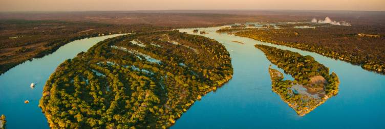 Arrival & Tranfer to Hotel, Zambezi Sunset Cruise, Boma Dinner & Drum Show