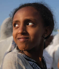 Young girl in traditional clothing.