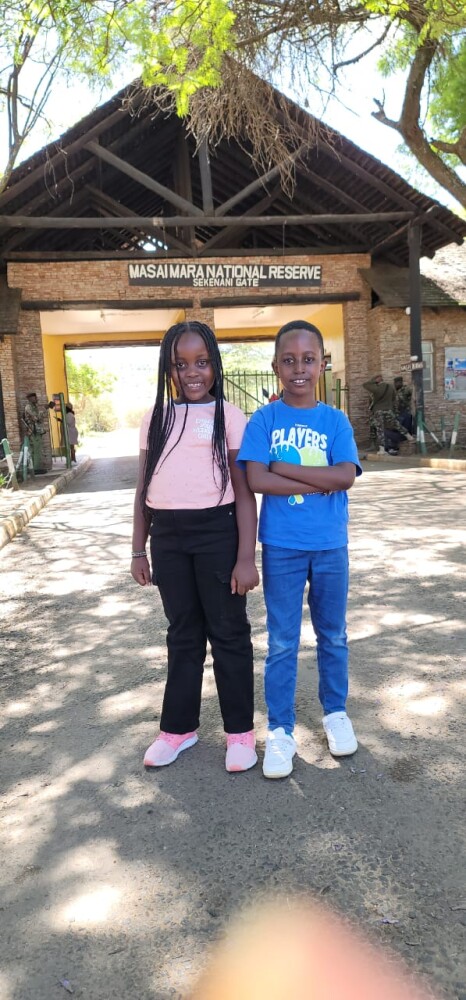 My children capturing moments at the Masai Mara Sekenani Gate